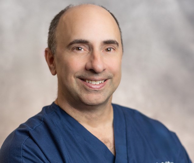 smiling DR. Ira Goldberg